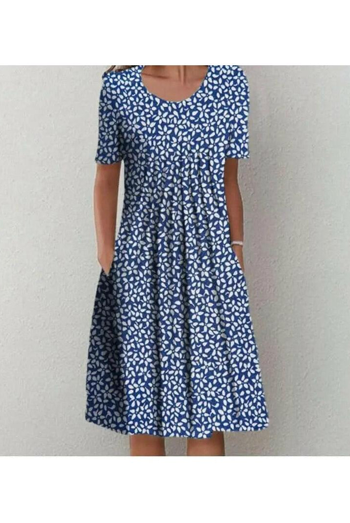 Violette classic printed dress by Lumina Wear featuring a red floral pattern, sleeveless design, and knee-length fit.