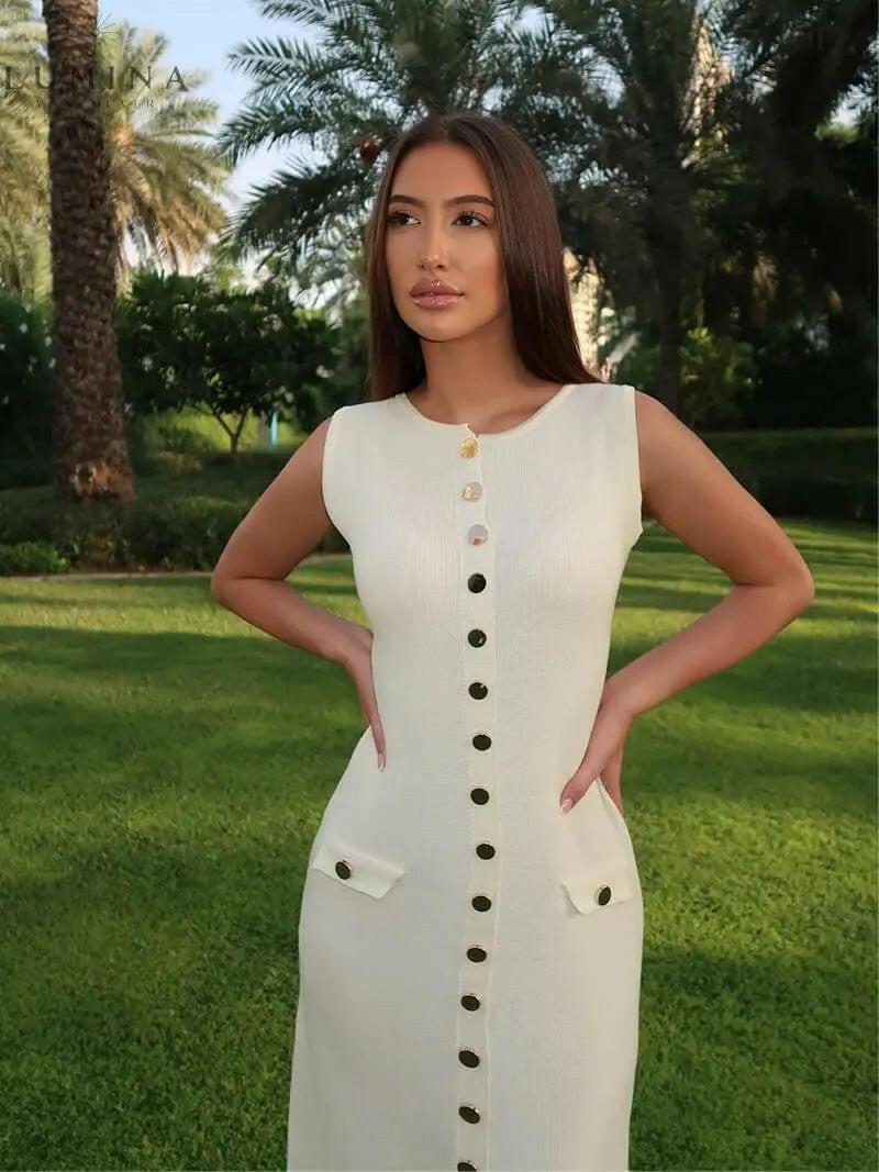 Beige Amaris maxi dress by Lumina Vancouver, suitable for autumn, shown on a model with flowing fabric and elegant design.