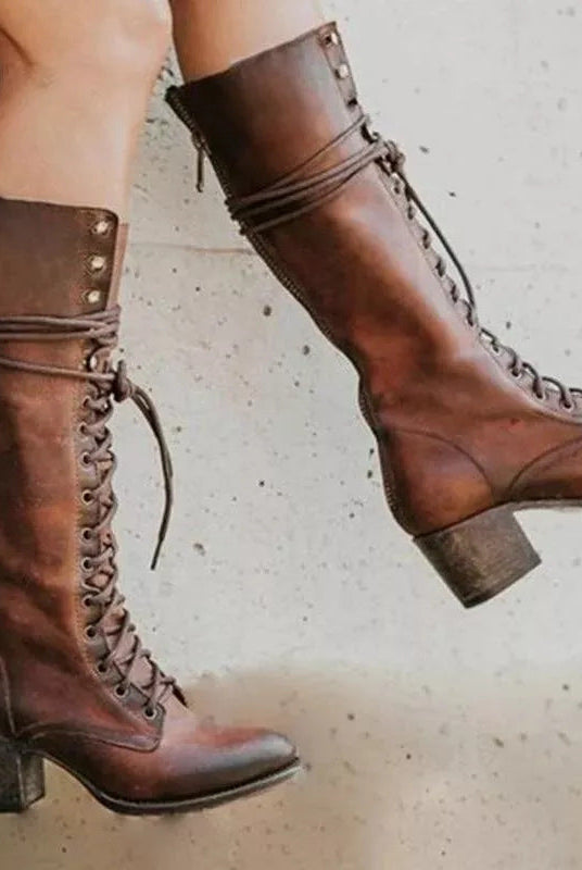 Black lace-up knee-high boots with block heel from Lumina Wear, featuring edgy style and sleek design for women.