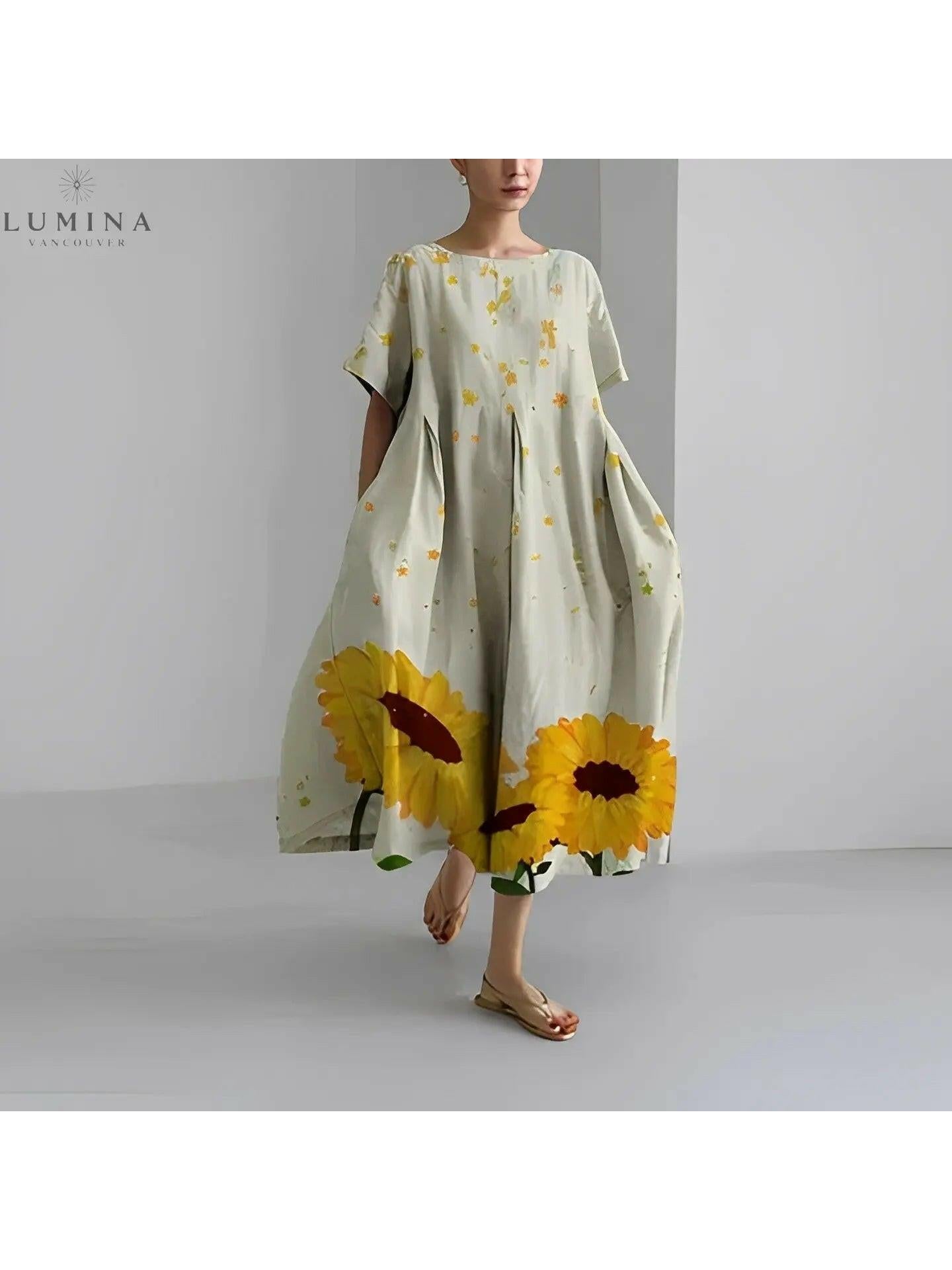 Lumina Vancouver Amelia floral dress with vibrant flower patterns, sleeveless design, and elegant fit for casual or special occasions.
