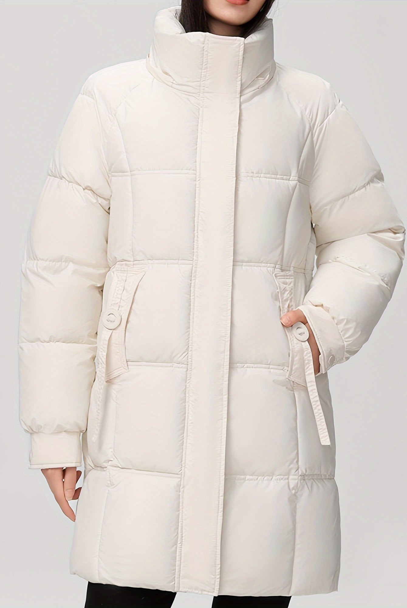 Black Amelia Lumina Wear hooded longline puffer coat with belt, stylish winter outerwear, shown on a model.