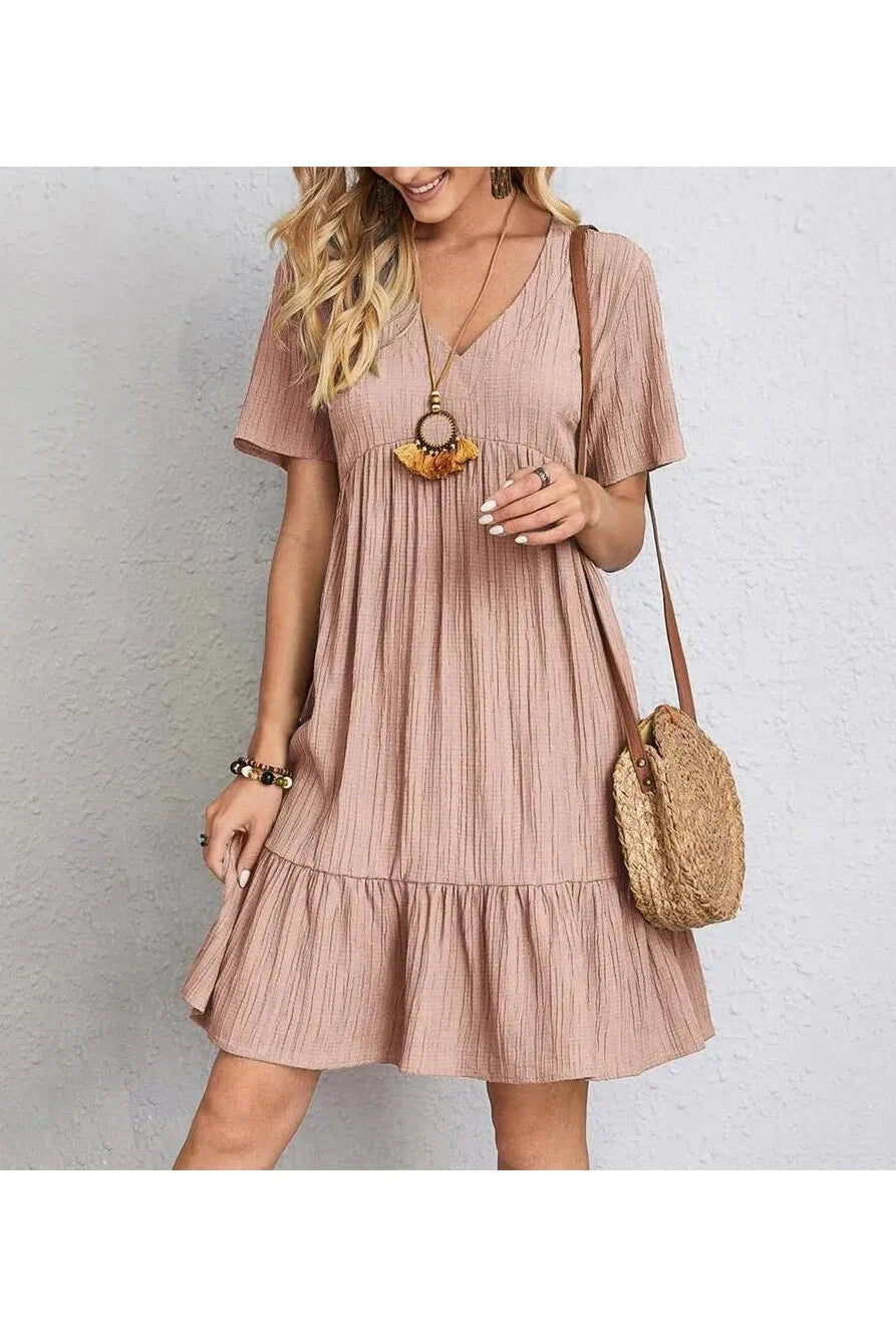 Brown AMY™ casual summer dress by Lumina Vancouver, lightweight and stylish for warm weather, shown on a hanger.