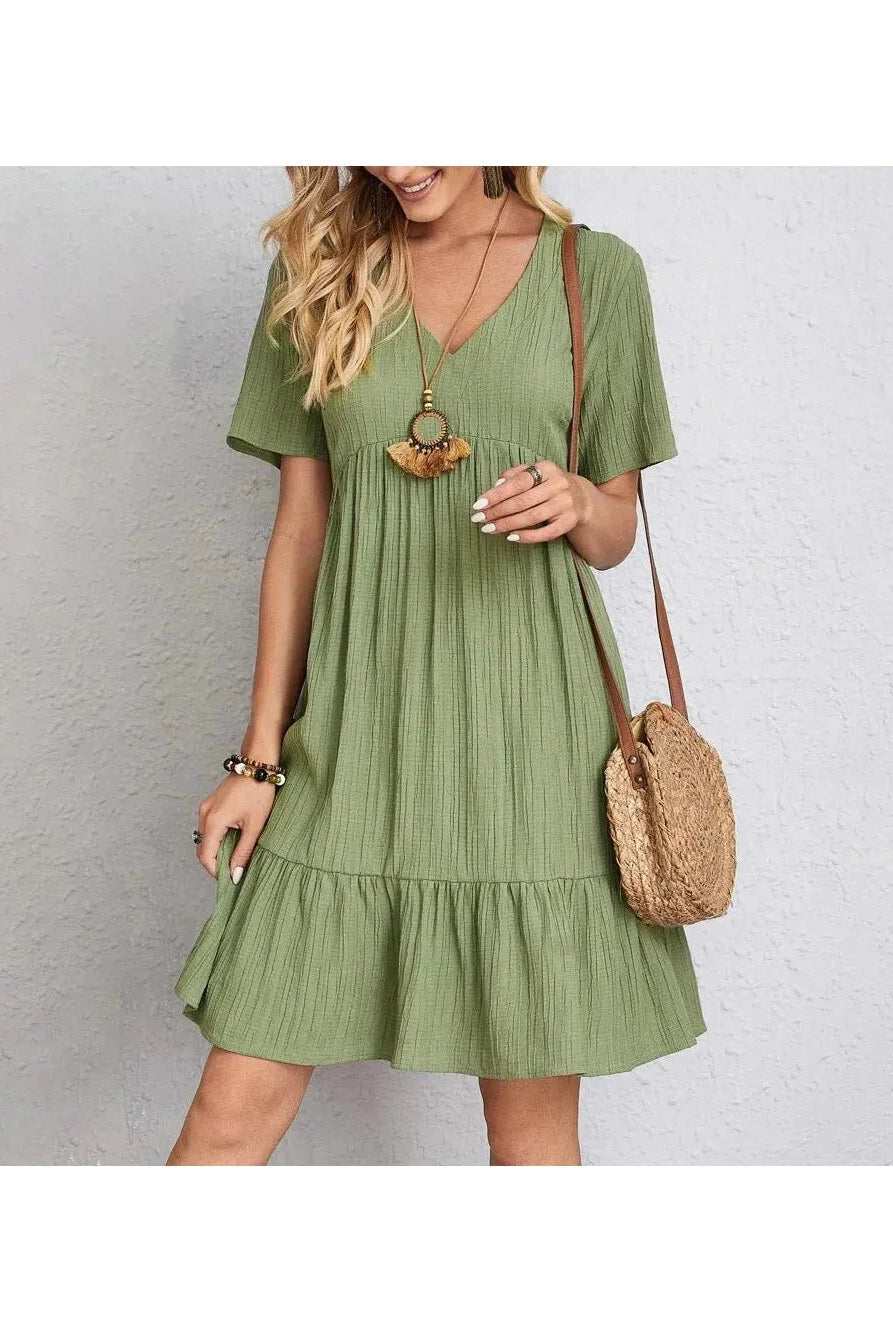 Brown AMY™ casual summer dress by Lumina Vancouver, lightweight fabric, sleeveless design, displayed on a hanger.