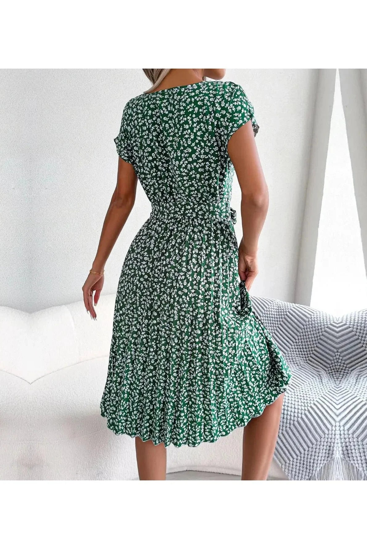 Blue Anabelle™ floral pleated midi dress by Lumina Vancouver, featuring elegant pleats and a flowing silhouette.