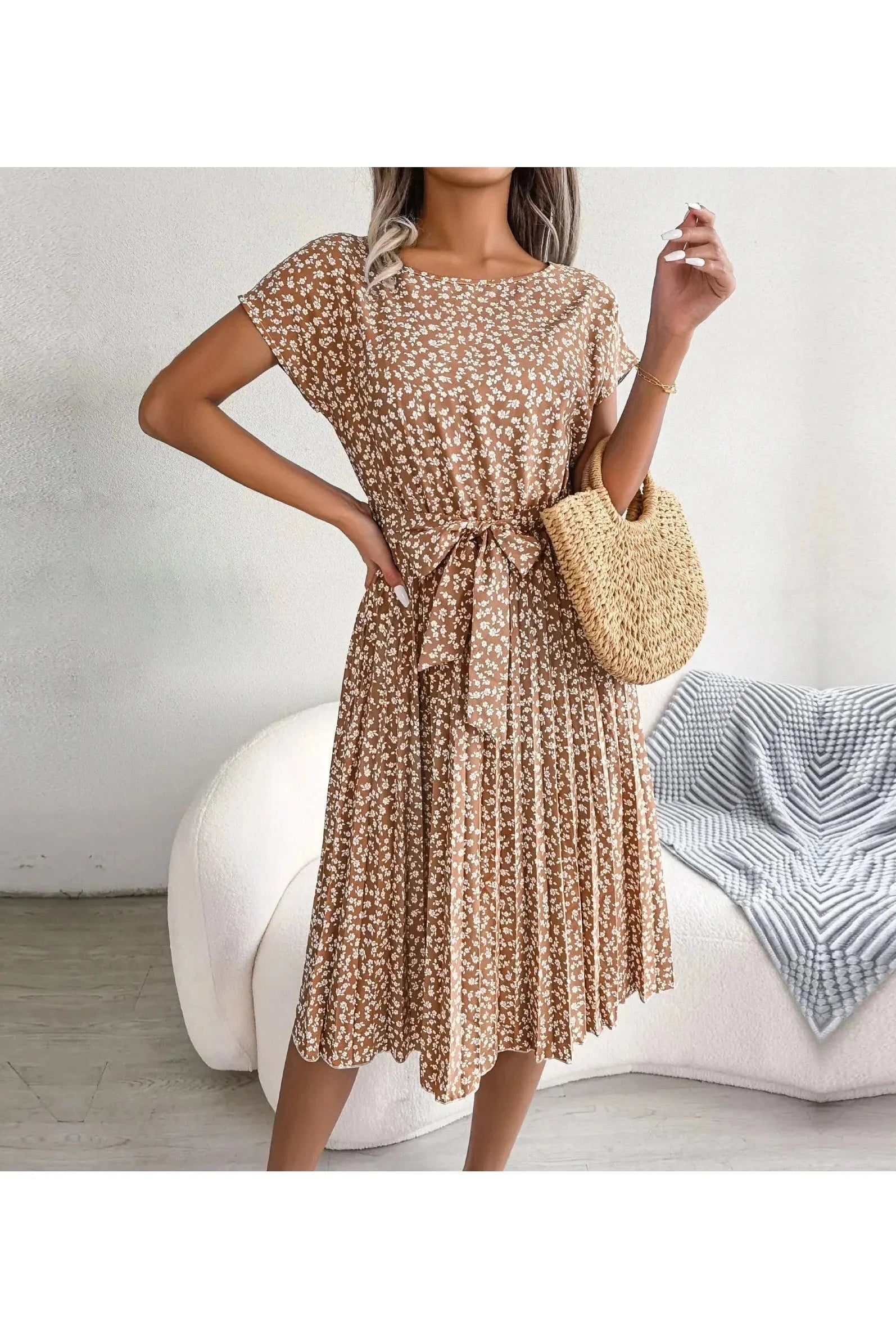 Blue Anabelle™ floral pleated midi dress by Lumina Vancouver, showcasing elegant pleats and a stylish floral pattern.