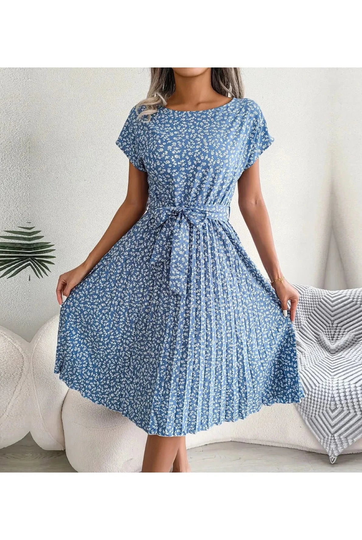 Blue Anabelle™ floral pleated midi dress by Lumina Vancouver, featuring elegant pleats and a flowing silhouette.