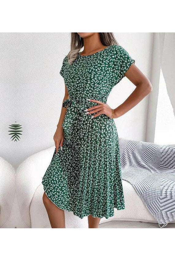 Blue Anabelle™ Floral Pleated Midi Dress by Lumina Vancouver, showcasing a flowy, elegant design with floral patterns.