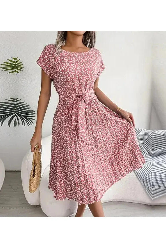 Blue Anabelle™ floral pleated midi dress by Lumina Vancouver, showcasing elegant pleats and a flowy silhouette.