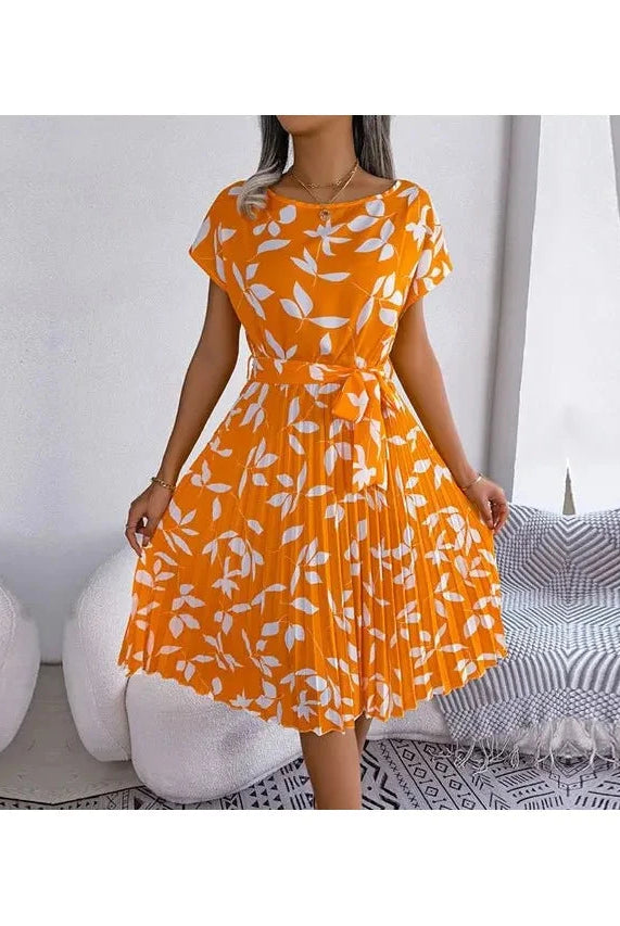 Blue Anabelle™ floral pleated midi dress by Lumina Vancouver, featuring a flowing design and elegant midi length.