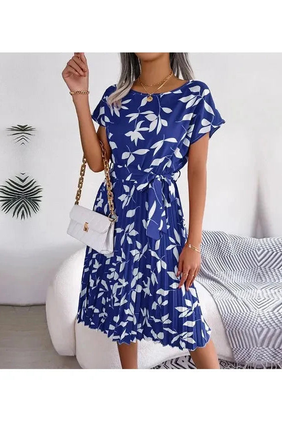 Blue Anabelle™ floral pleated midi dress by Lumina Vancouver, featuring elegant pleats and a flowy silhouette.