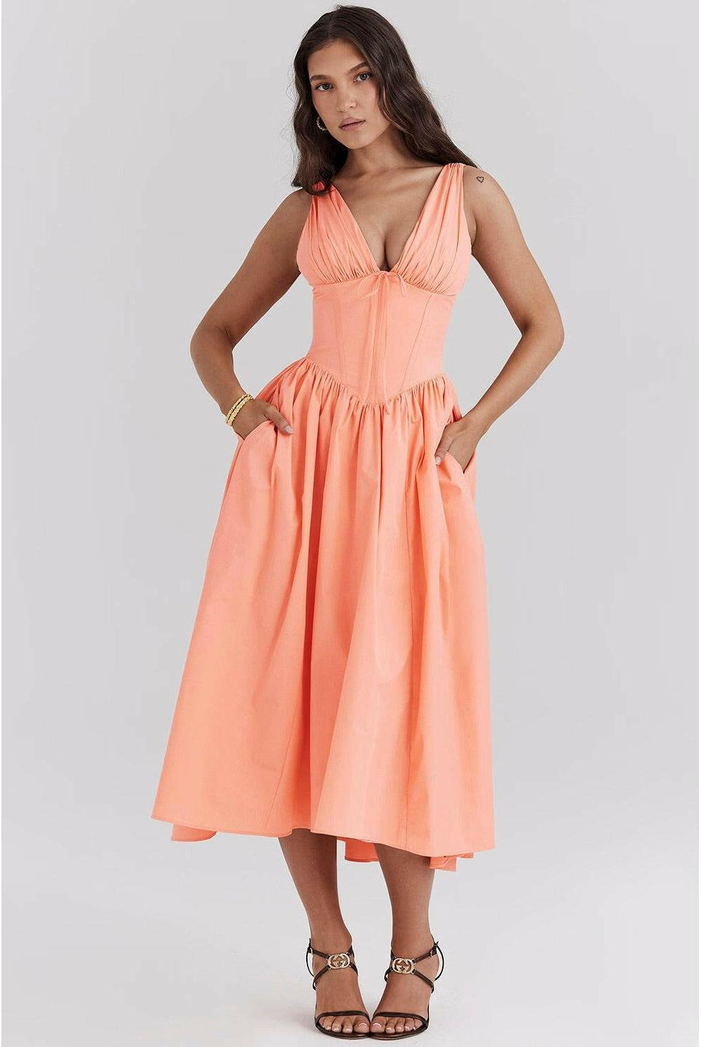 Yellow floral Angelica summer dress by Lumina Wear, featuring a flowing design and elegant style, size small.