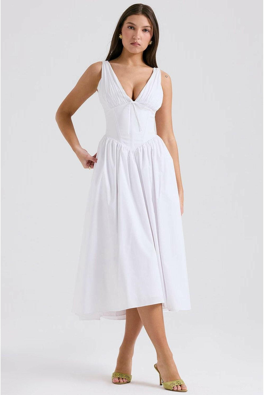 Yellow floral Angelica summer dress by Lumina Wear, showcasing a flowy, elegant design perfect for warm weather.