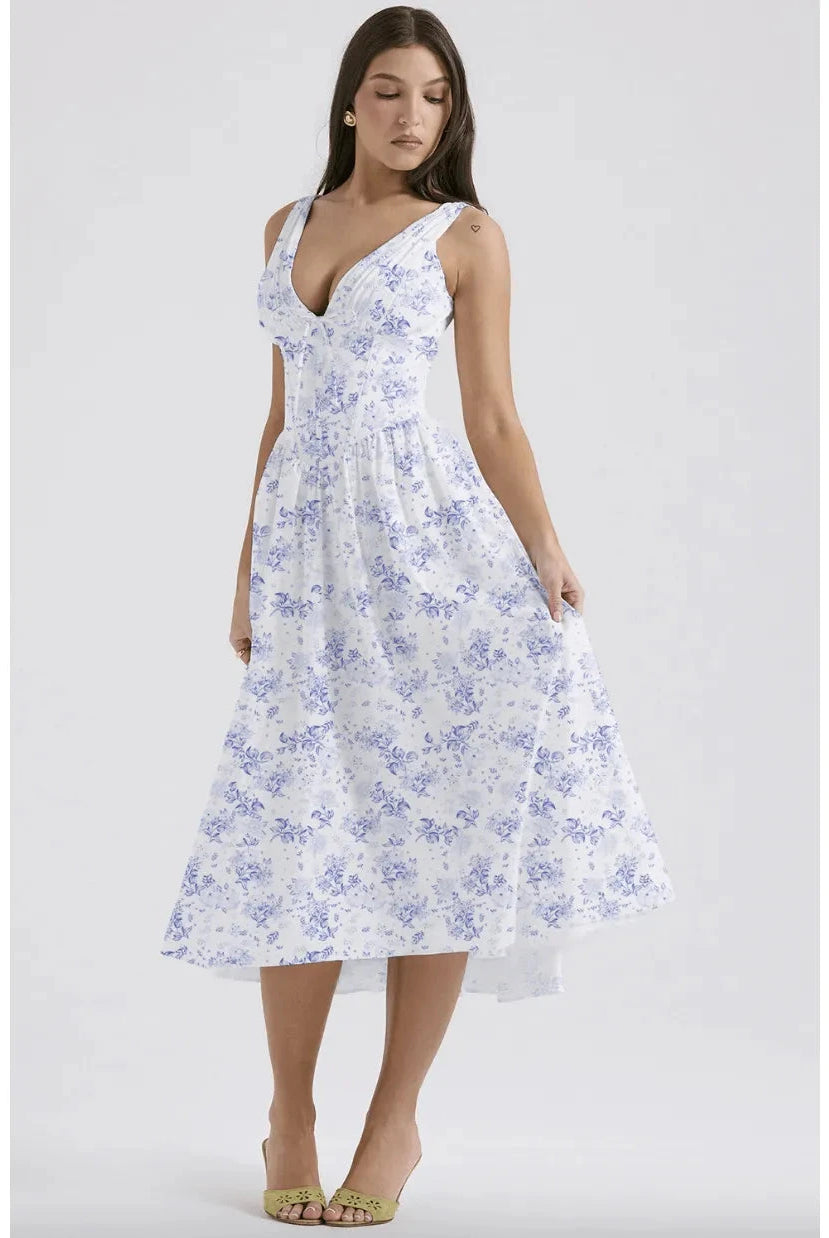 Yellow floral Angelica summer dress by Lumina Wear, lightweight and elegant with a relaxed fit and delicate floral pattern.