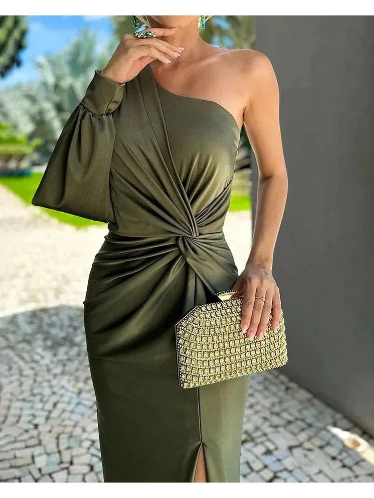 Green Anna elegant evening wedding guest dress by Lumina Vancouver, featuring a stylish and sophisticated design.