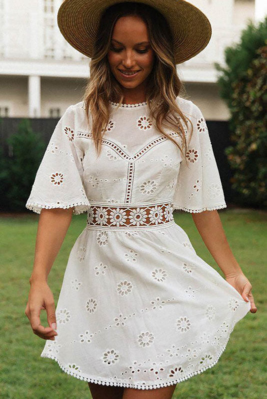 Arabella Celestine eyelet mini dress by Lumina Vancouver, white with delicate eyelet details and short sleeves.