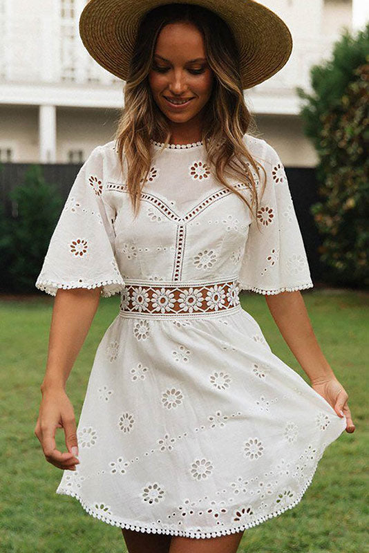 Arabella Celestine eyelet mini dress by Lumina Vancouver, white with delicate eyelet details and short sleeves.