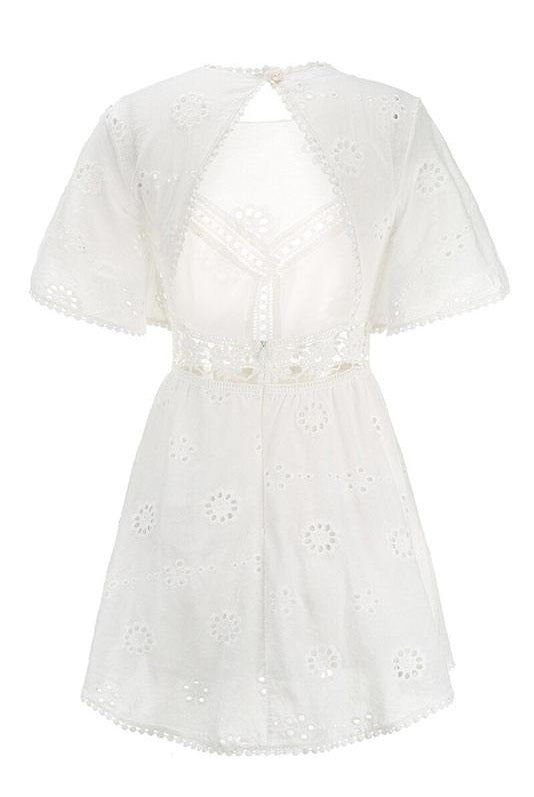 Arabella Celestine white eyelet mini dress by Lumina Vancouver, featuring delicate eyelet fabric and a stylish, feminine silhouette.