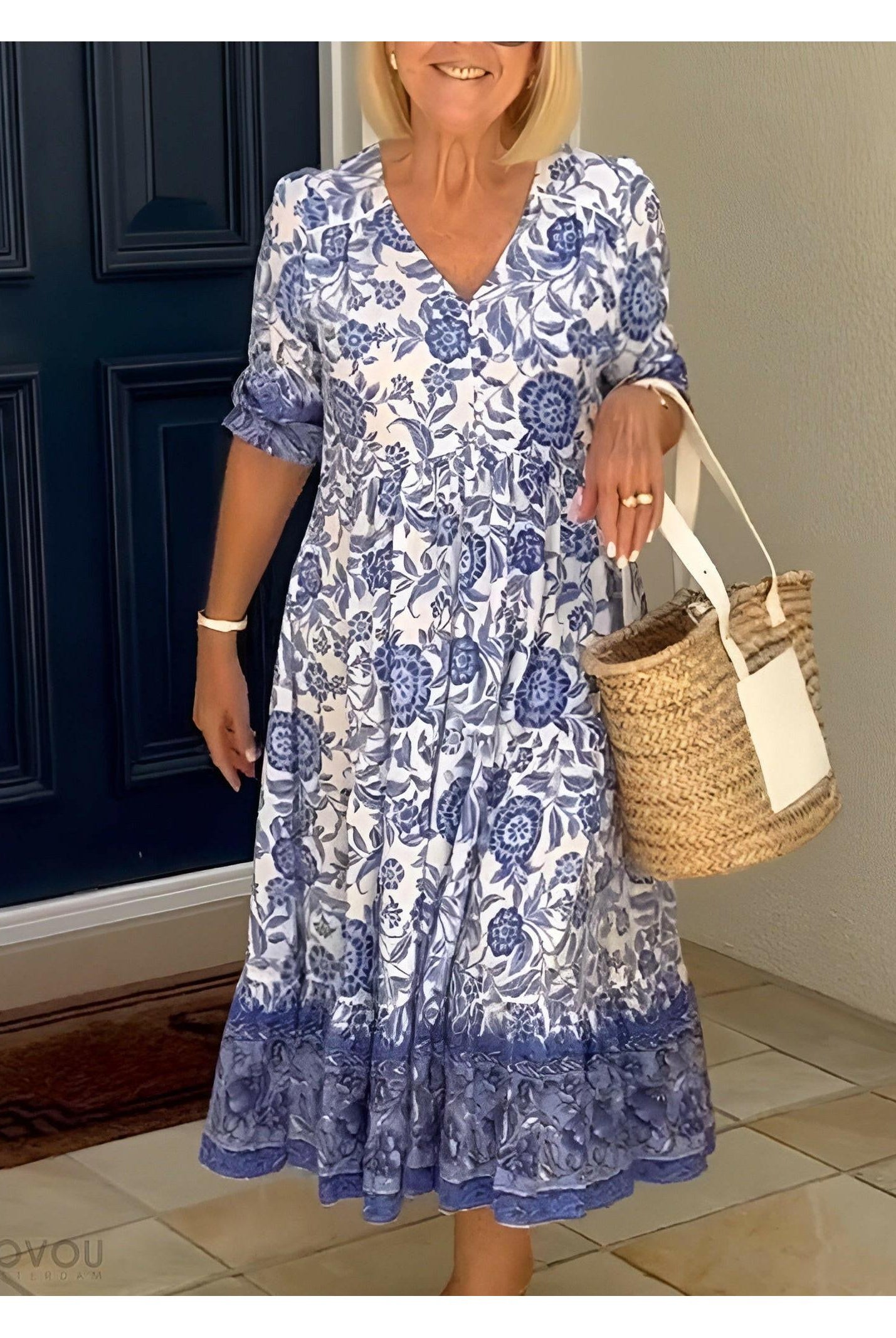 Blue ARIA floral dress with V-neck by Lumina Wear, featuring elegant design and fitted silhouette for stylish occasions.