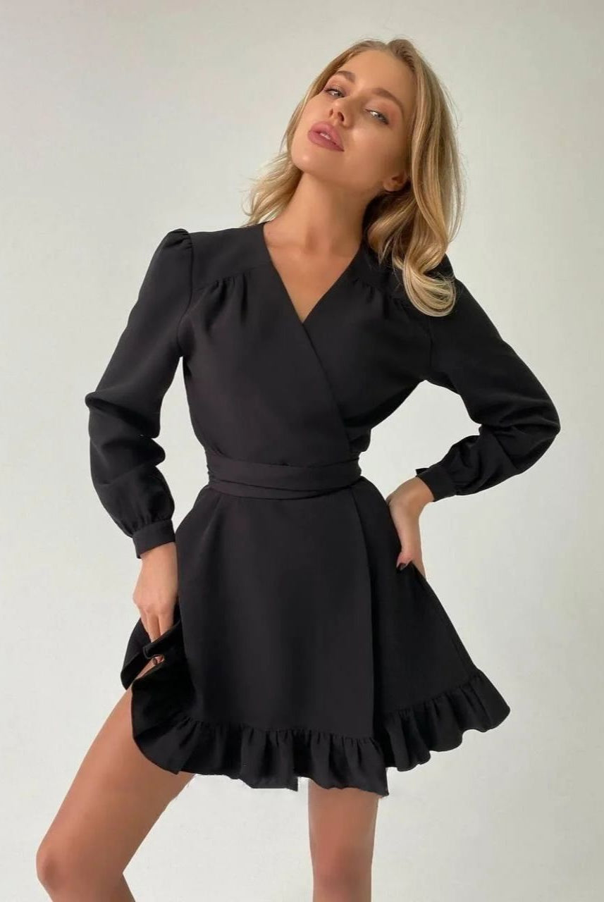 White Aria long sleeve mini dress with fitted bodice by Lumina Wear, showcased on a model with elegant styling.
