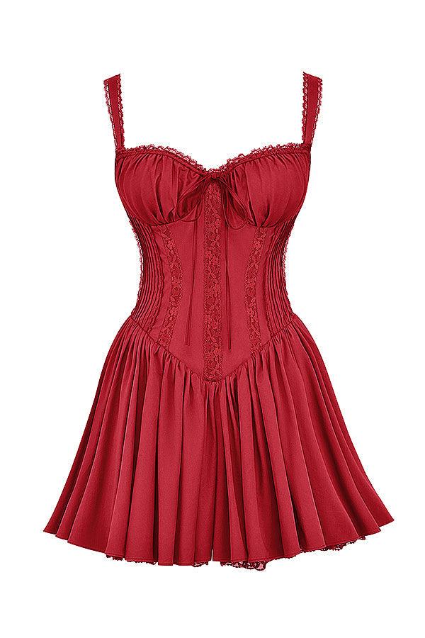 White mini dress with lace-trim bodice from Lumina Vancouver, featuring a fitted silhouette and delicate lace details.