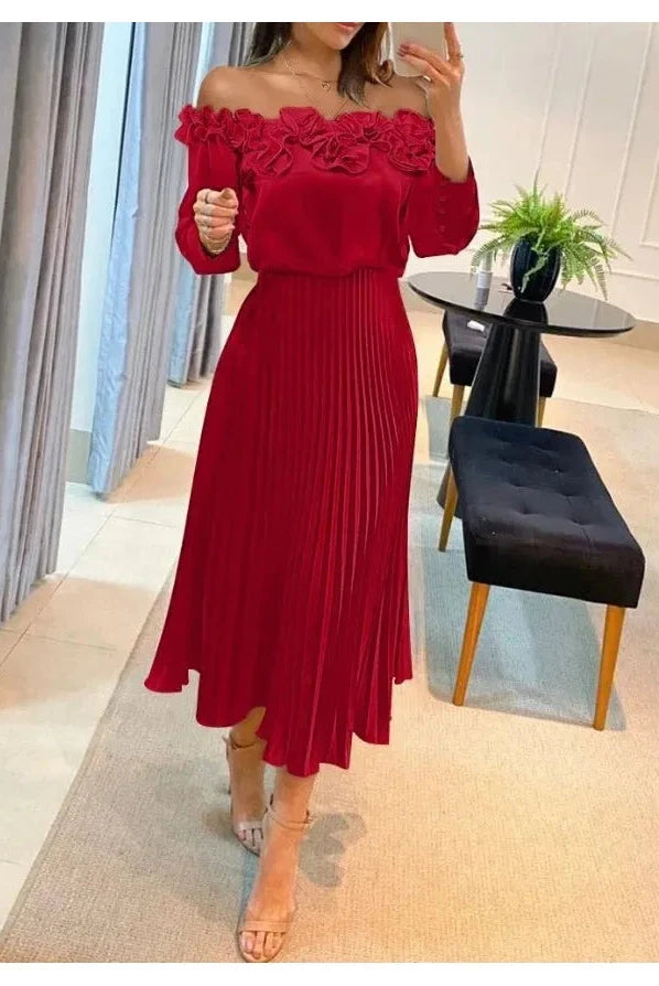 Red Lumina Wear Sisko off-shoulder maxi dress displayed on a hanger with flowing fabric and elegant design.