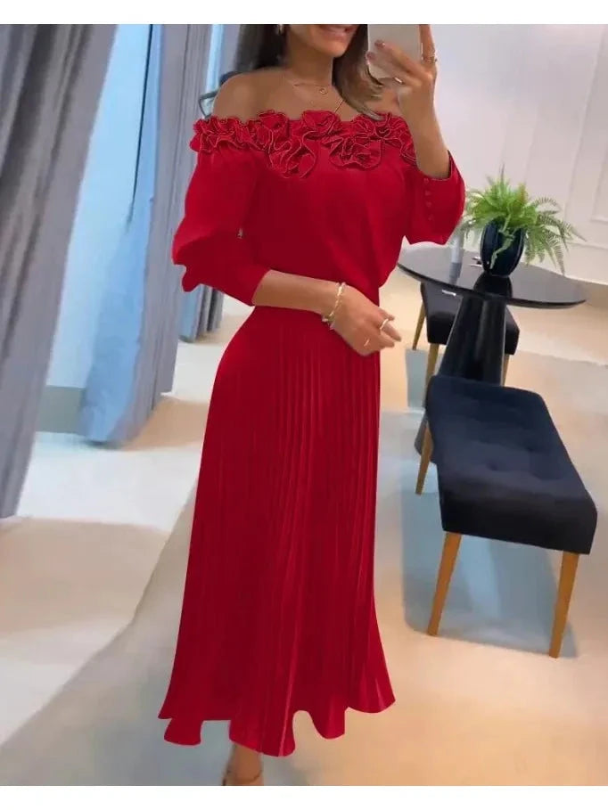 Red off-shoulder maxi dress by Lumina Vancouver, featuring a flowing silhouette and elegant design for stylish occasions.