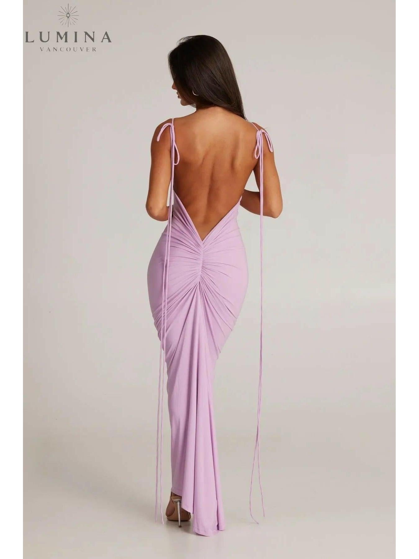 Red Astrid backless maxi dress by Lumina Vancouver, elegant wedding guest gown with flowing fabric and stylish design.