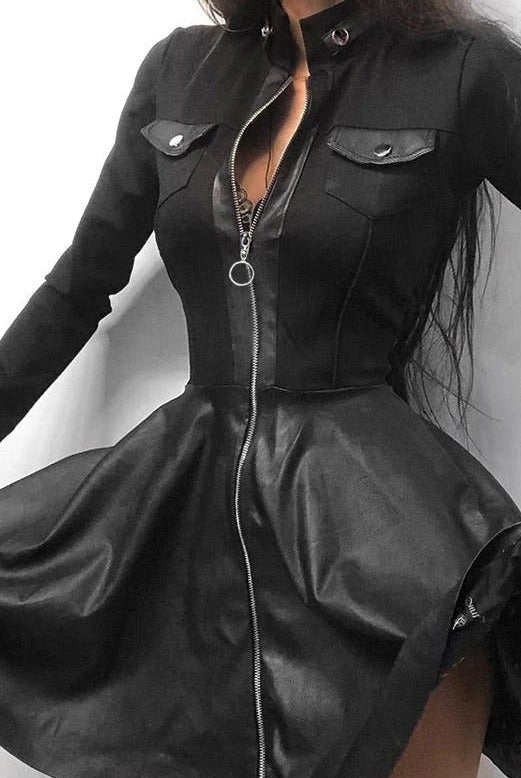 Black faux leather mini dress by Lumina Wear featuring a fitted silhouette and stylish design, perfect for trendy fashion looks.
