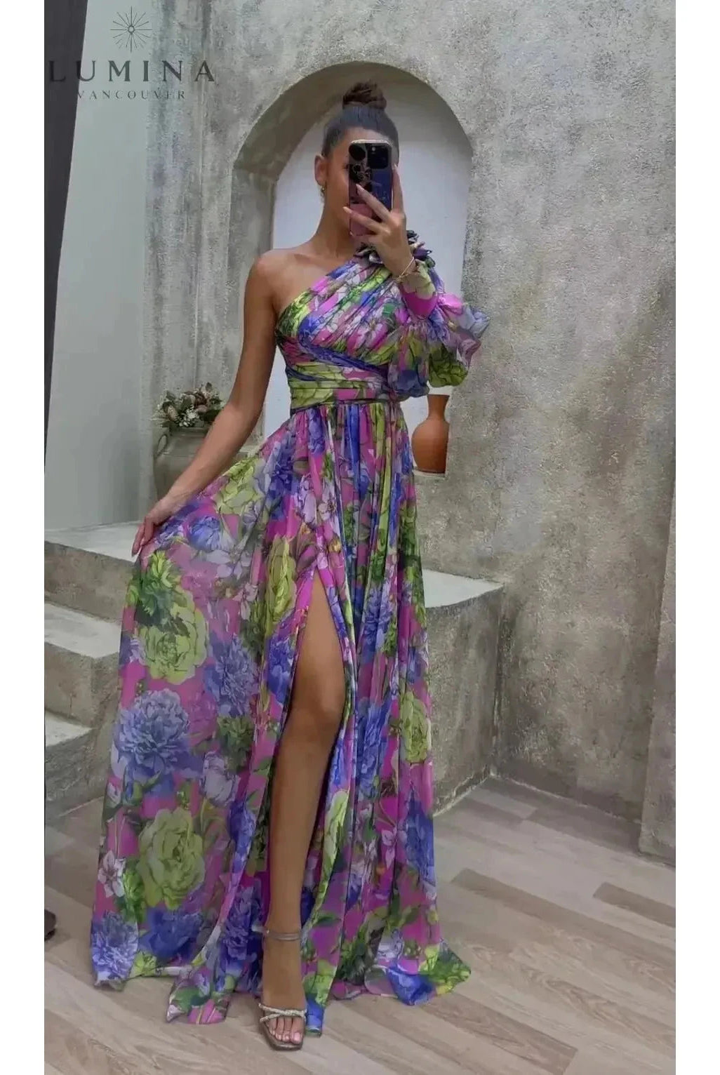 Purple Audrey evening gown by Lumina Wear featuring a flowing design, perfect for wedding guests and special occasions.