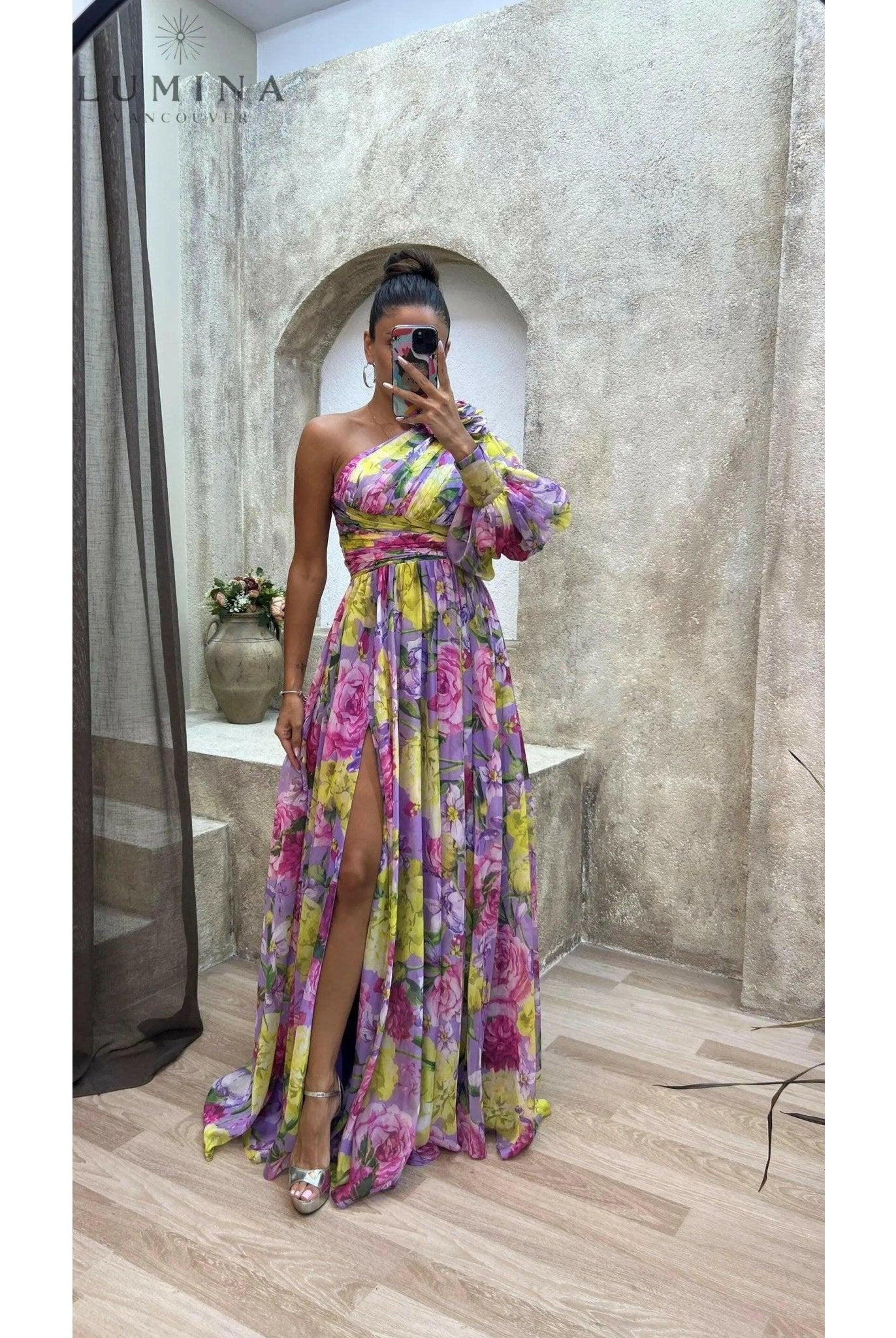 Purple Audrey evening gown by Lumina Wear featuring a flowing design, ideal for wedding guests and formal occasions.