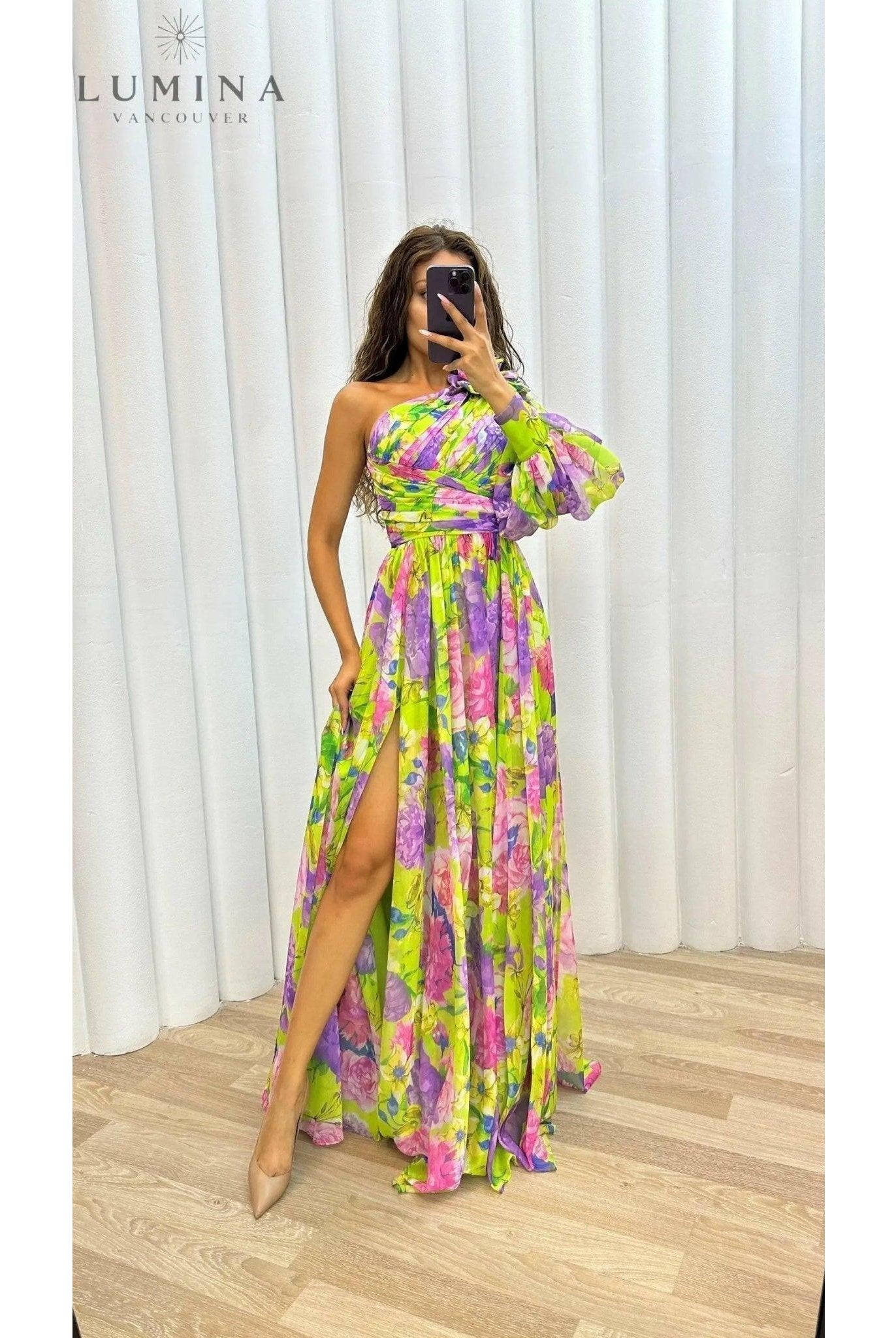 Purple Audrey evening gown by Lumina Wear, flowing design perfect for wedding guests, shown on a model.