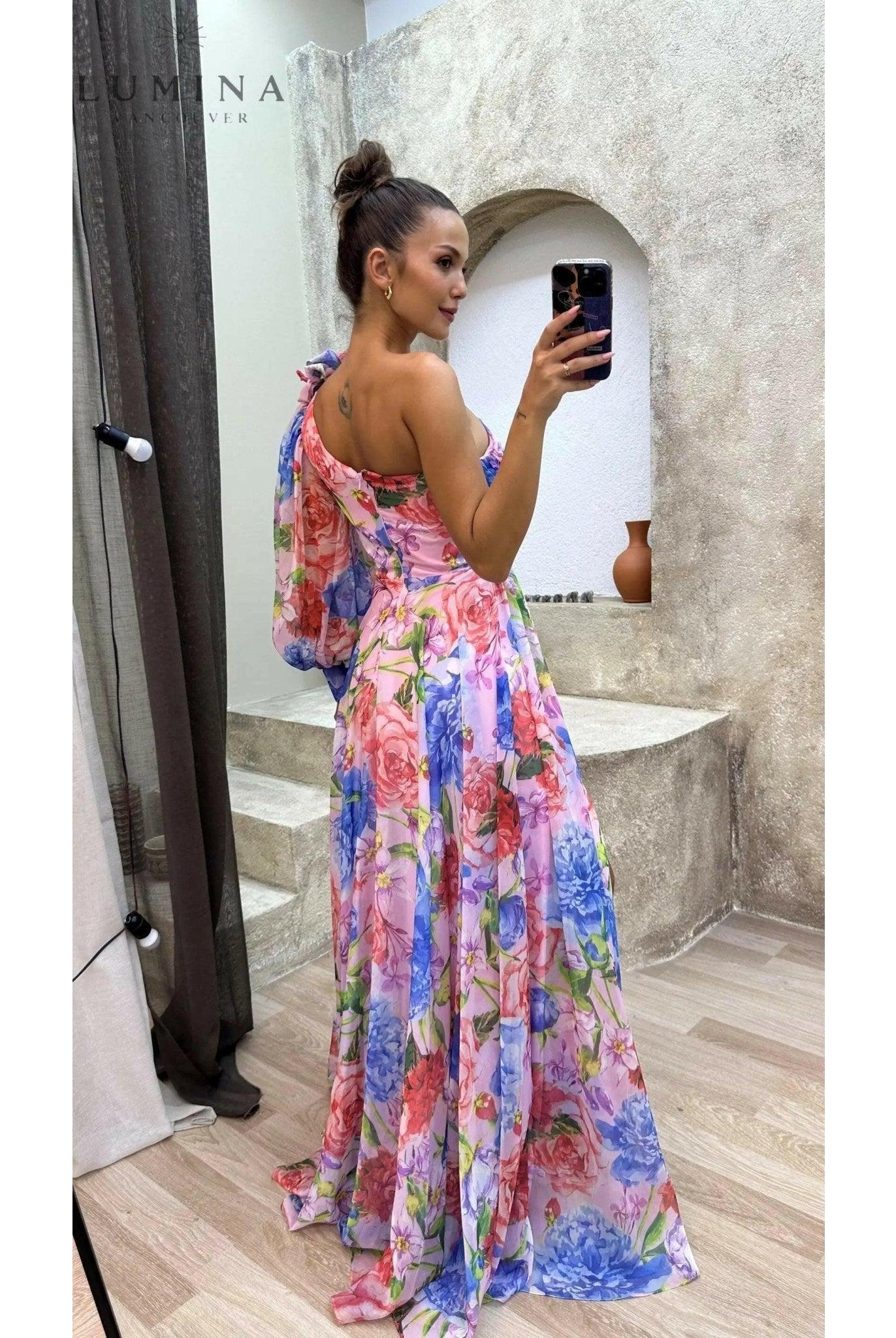 Purple Audrey evening gown by Lumina Wear featuring a flowing design, perfect for wedding guests or formal events.