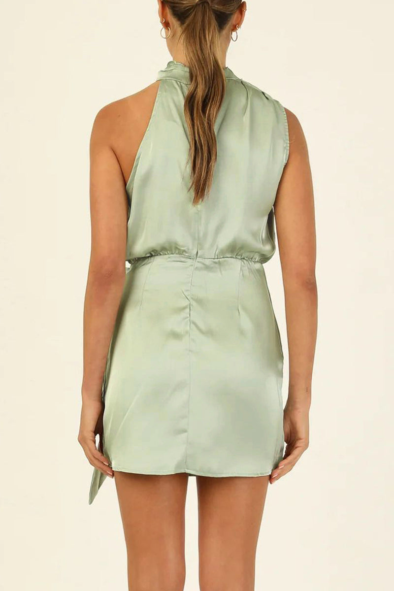 Aurora Belle satin halter mini dress by Lumina Vancouver in apricot color, featuring a sleek fit and elegant halter neckline.