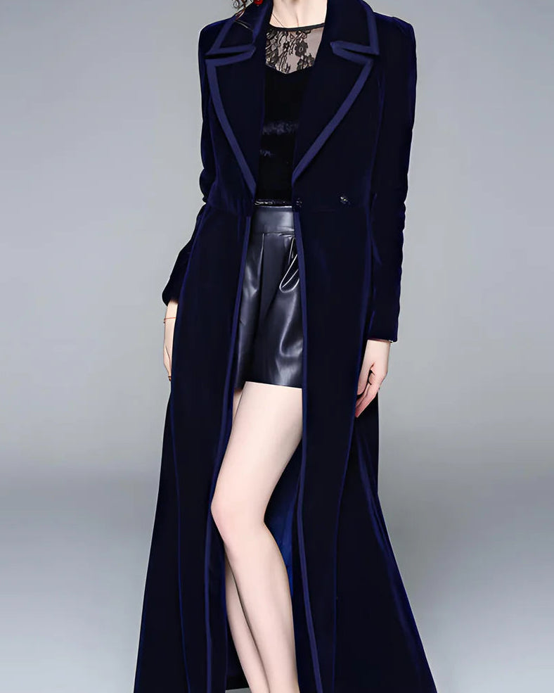 Lumina Wear double-breasted long velvet coat in midnight blue, featuring a stylish collar and tailored fit.