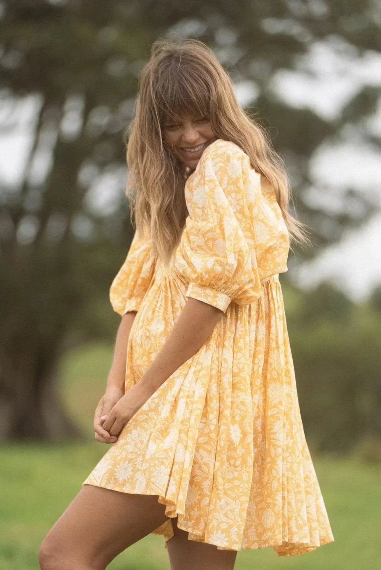 Blue Aurora Flow Boho Floral women's mini dress by Lumina Vancouver, featuring a flowy design and bohemian floral pattern.