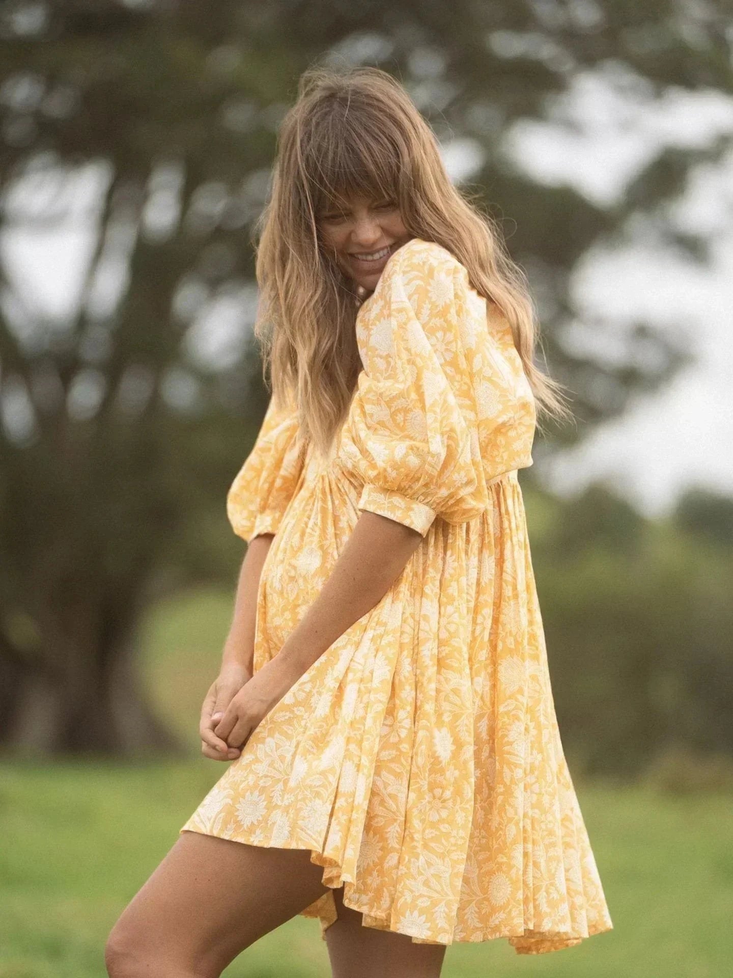 Blue Aurora Flow Boho Floral women's mini dress by Lumina Vancouver, featuring a flowy design and bohemian floral pattern.