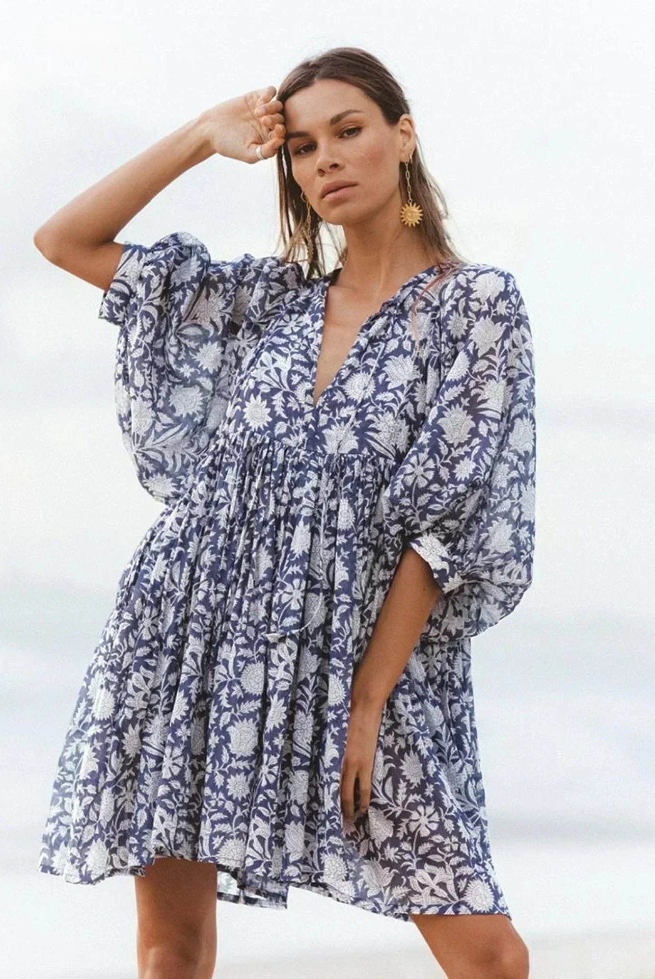Blue Aurora Flow Boho Floral mini dress for women by Lumina Vancouver, featuring a flowy, bohemian floral design.