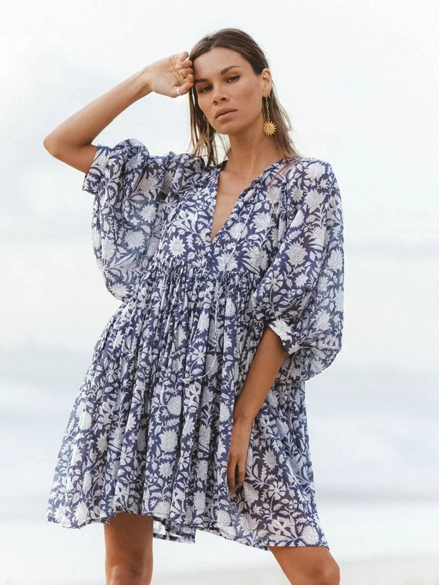 Blue Aurora Flow Boho Floral mini dress for women by Lumina Vancouver, featuring a flowy, bohemian floral design.