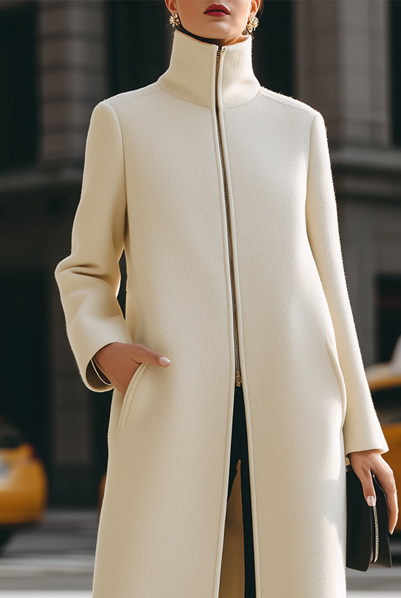 Cream high-neck zip front maxi coat by Lumina Vancouver, stylish and warm outerwear with a sleek design.