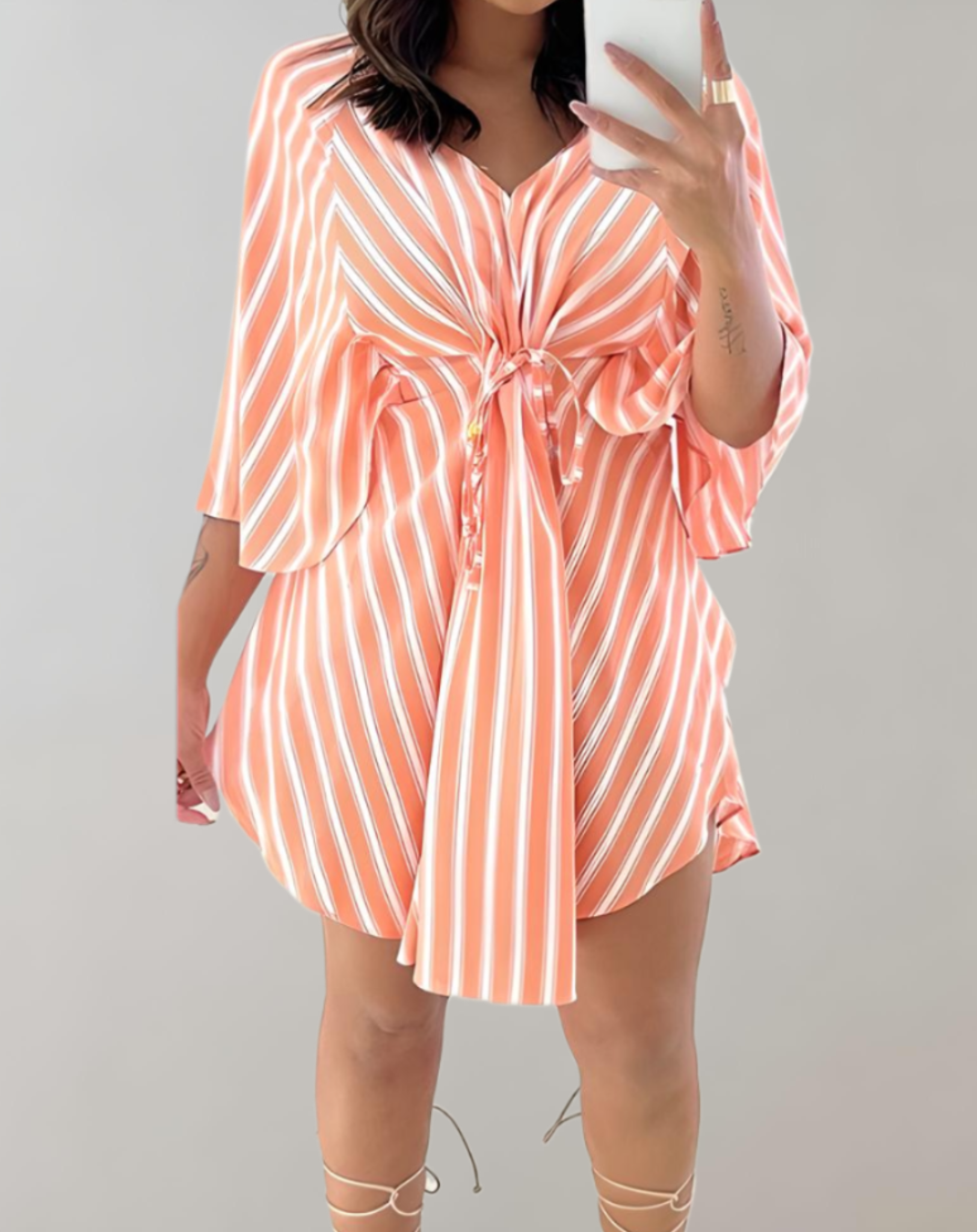 Bright orange Aurora Kaftan Dress by Lumina Vancouver, lightweight mini dress with V-neck and relaxed fit, perfect for warm weather.