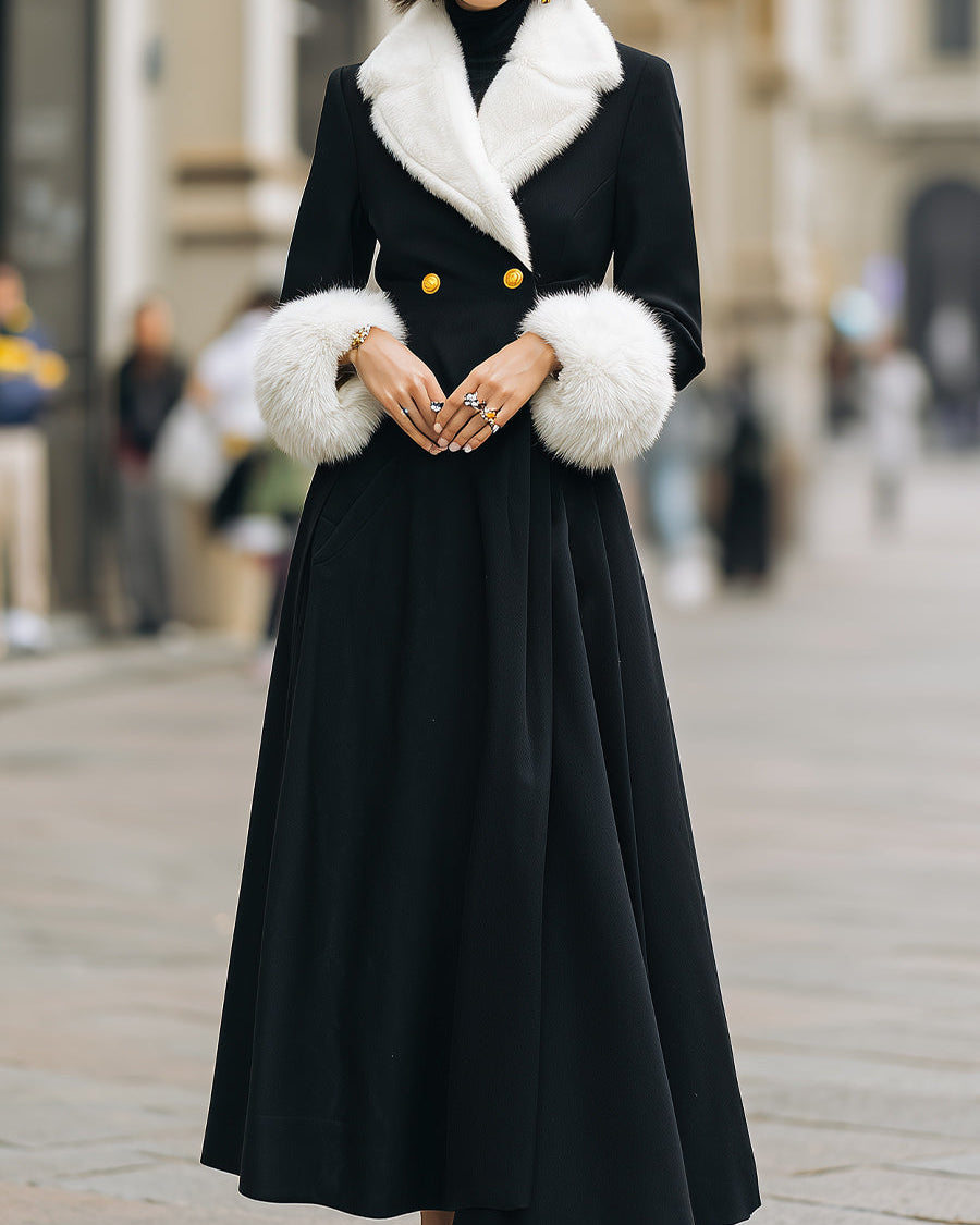 Lumina Wear Beryl longline coat in black with white faux fur trim, stylish winter outerwear with a sleek design.