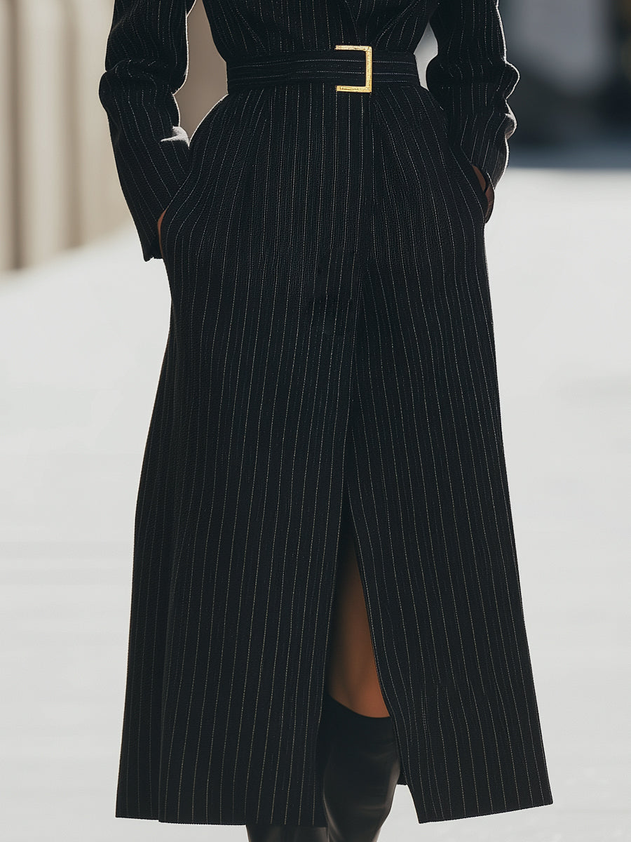 Black Aurora Lumina Vancouver structured pinstripe belted long coat displayed on a hanger, showcasing its tailored design and belt details.