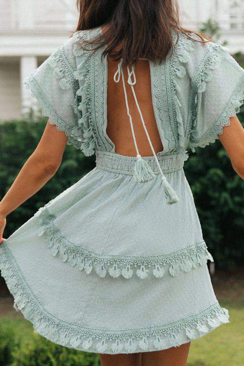Lumina Vancouver Kerttu Sunset Boho mini dress in baby blue with bohemian design, featuring flowing fabric and sunset-inspired patterns.