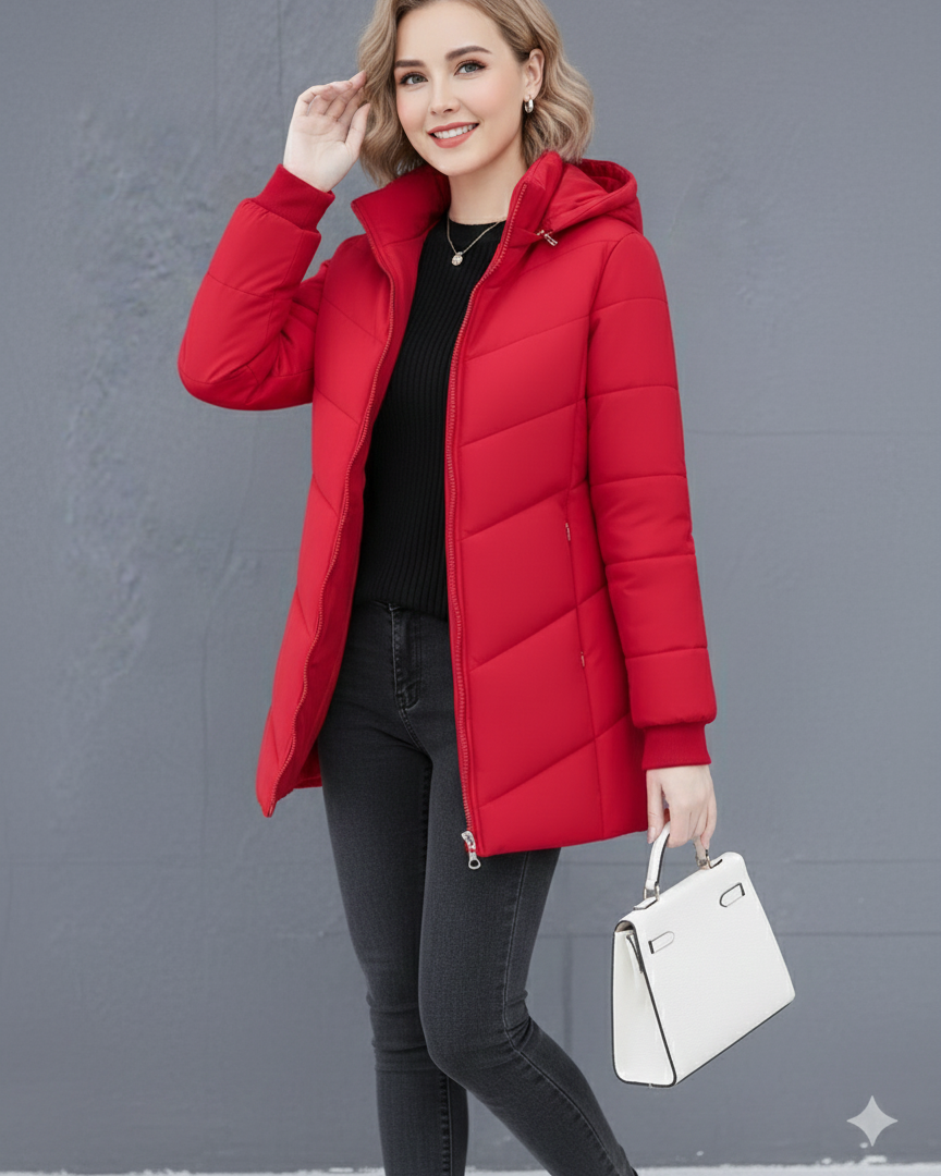 Lumina Wear Ava quilted hooded puffer jacket in green with streamlined fit, shown on a model in size XS.