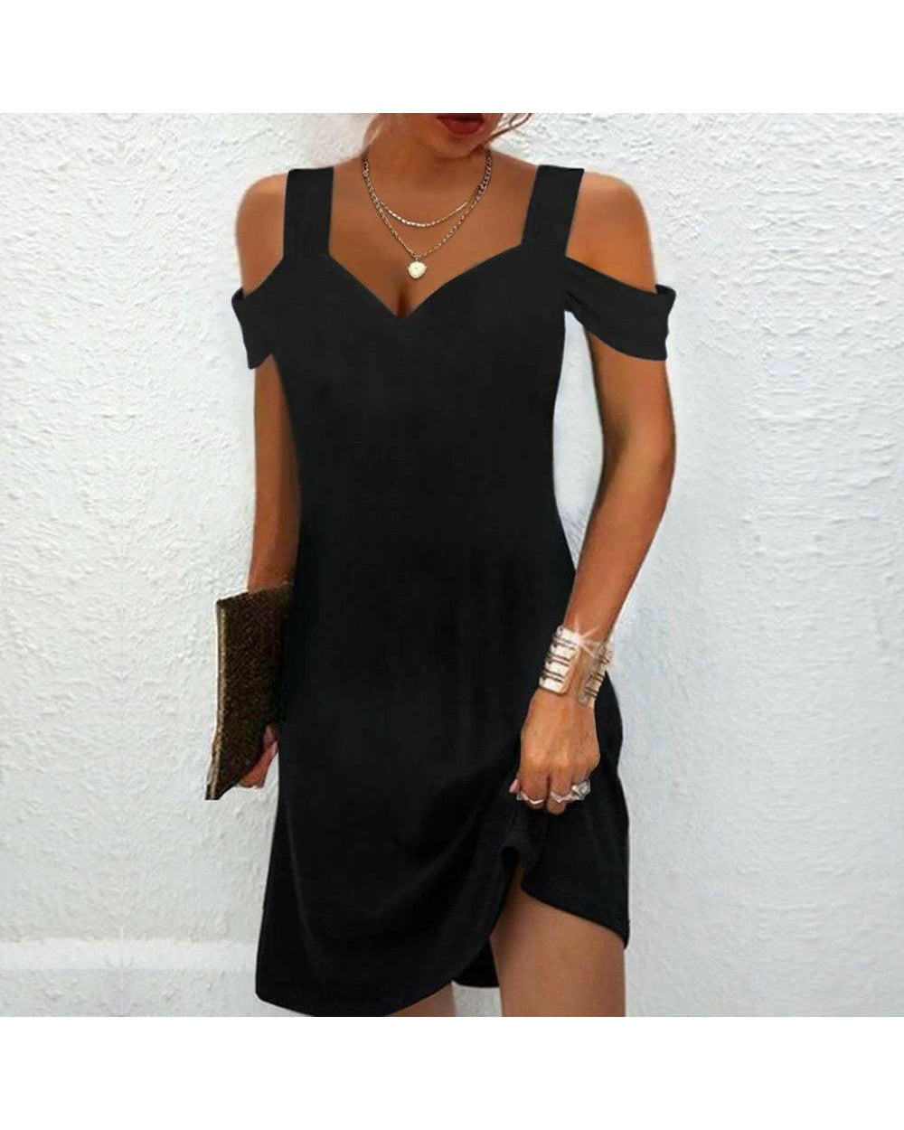 Lumina Wear Avril chic off-shoulder dress, stylish black dress with ruffle details, perfect for elegant occasions.