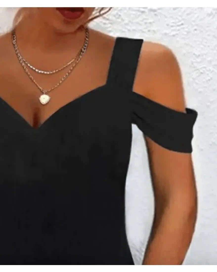 Lumina Wear Avril chic off-shoulder dress in size S, stylish and elegant, displayed on a hanger against a neutral background.