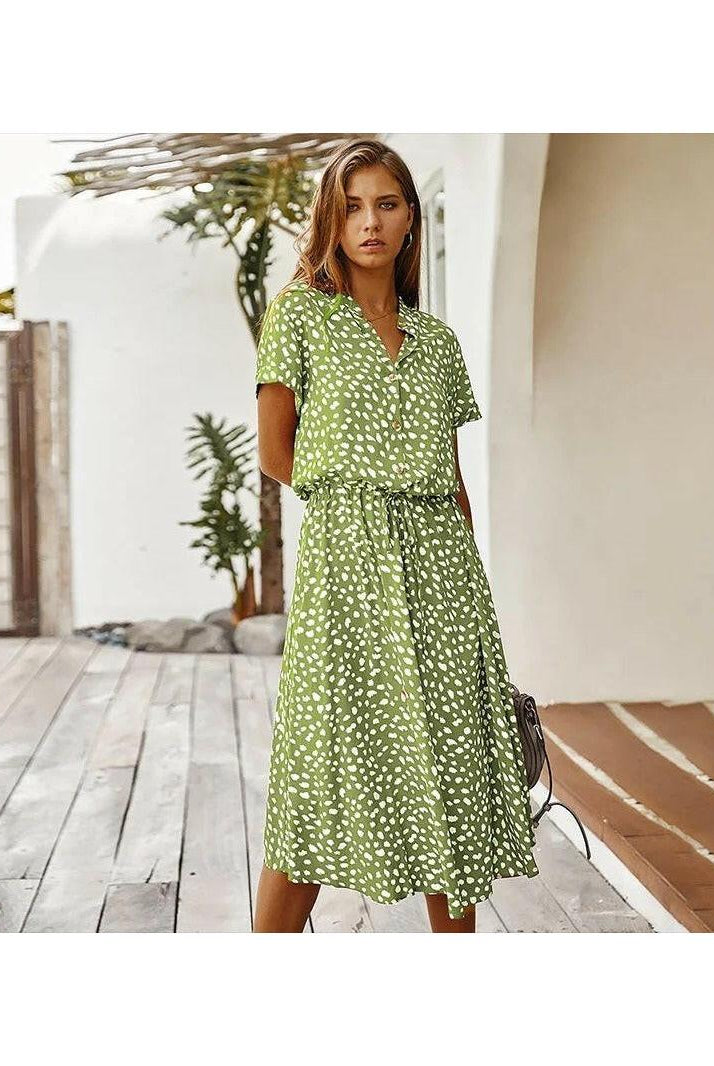 White Ayesha printed summer dress by Lumina Wear featuring lightweight fabric and floral patterns, perfect for warm weather.