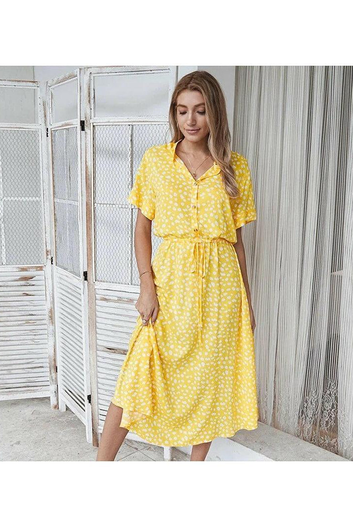 White Ayesha printed summer dress by Lumina Wear, lightweight and flowy, featuring floral patterns and casual style for warm weather.