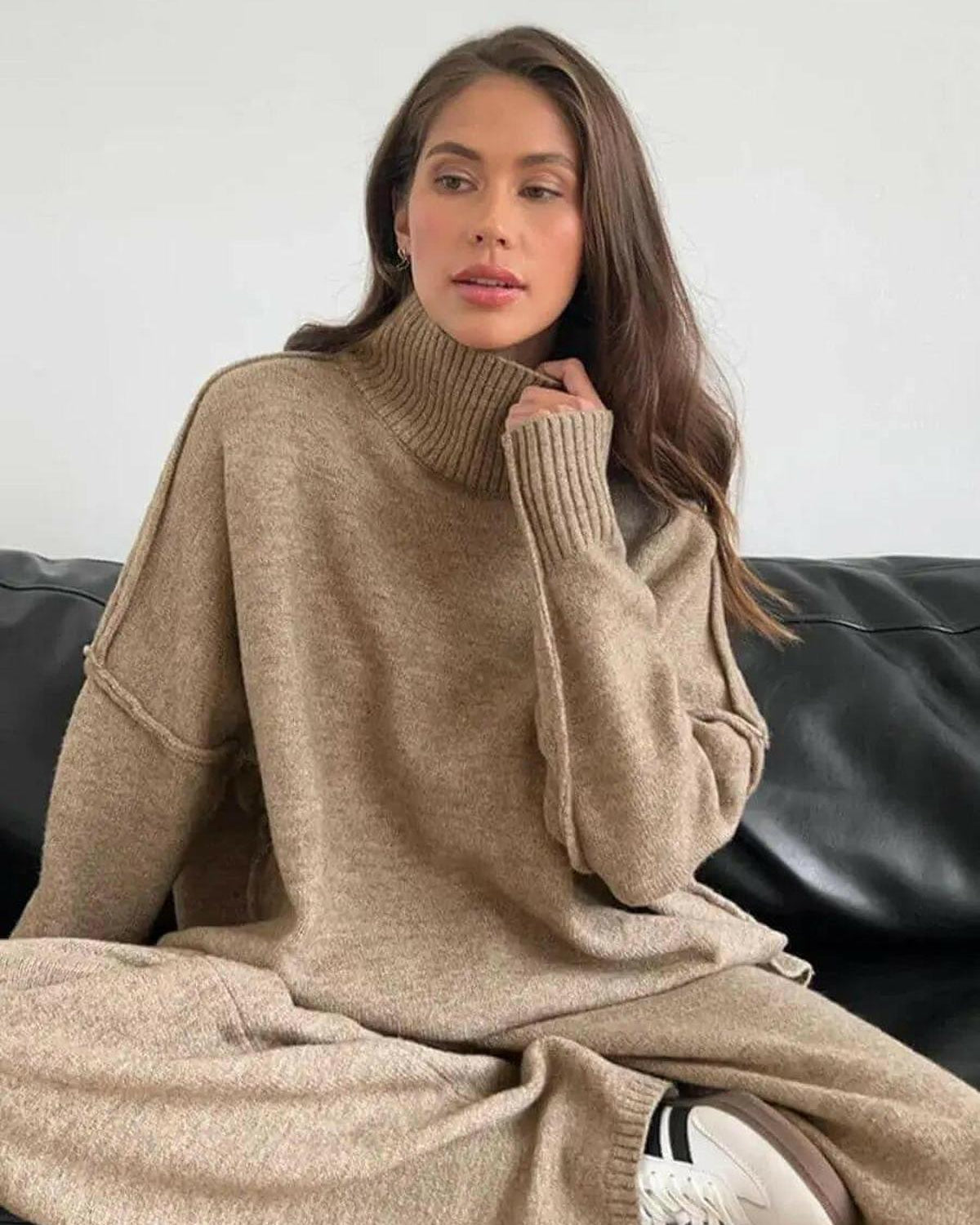 A caramel-colored knit set by Lumina Wear featuring a cozy sweater and matching pants, displayed on a hanger.