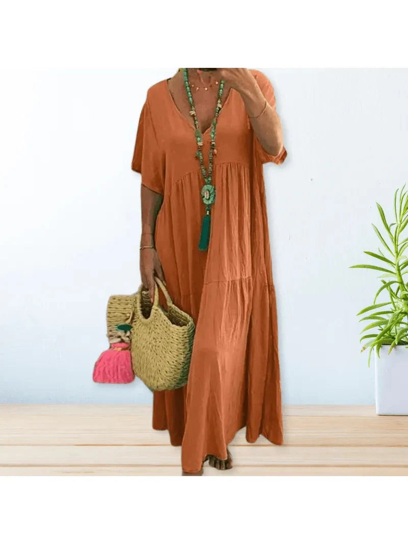 Beige Lumina Wear BAHAMA cotton linen dress, lightweight and stylish, displayed on a hanger.